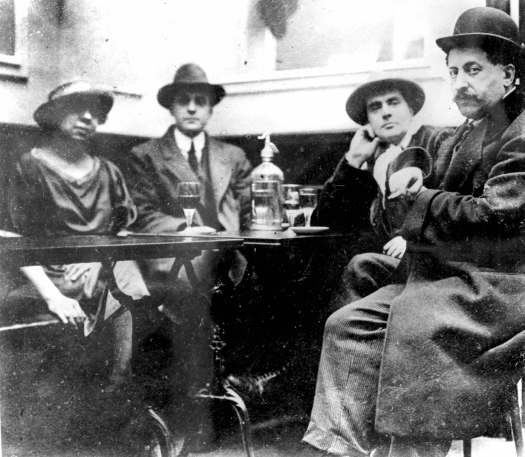 RVI753363 Amedeo Modigliani and Adolphe Basler at the Café du Dôme, Paris (b/w photo) by French Photographer, (20th century); Private Collection; (add.info.: Amedeo Clemente Modigliani (July 12, 1884 – January 24, 1920) was an Italian painter and sculptor who worked mainly in France. Adolphe Basler (1878-1949)); Roger-Viollet, Paris; FRENCH, ITALIAN, SPANISH & JAPANESE RIGHTS NOT AVAILABLE; French, it is possible that some works by this artist may be protected by third party rights in some territories